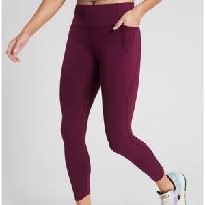 Athleta | Velocity Stash Pocket 7/8 Raw hem plum beach leggings L